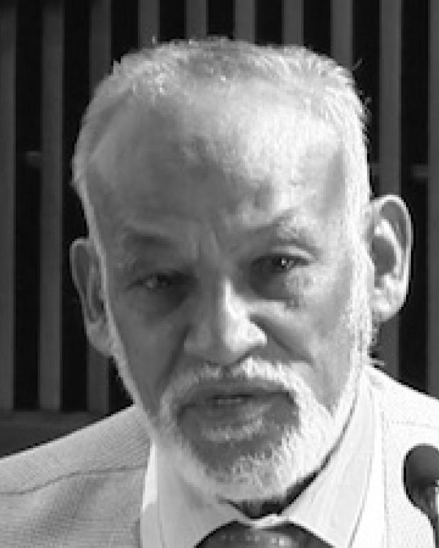 Dr. Malik Badri